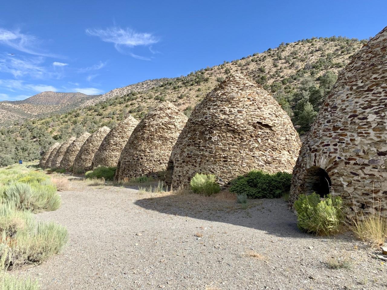 nine 25 foot tall rock beehive structures